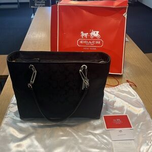 BNIB Coach black tote with silver chain accents dust bag included